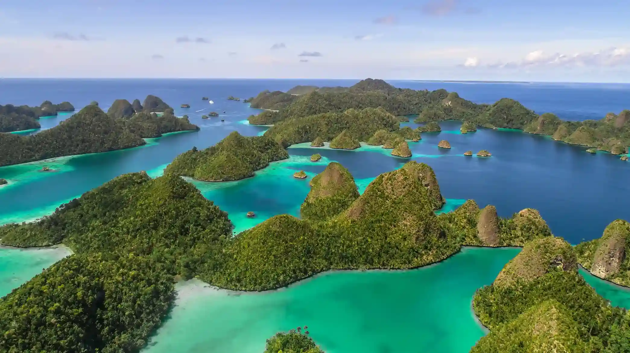 Karst islands and turquoise lagoons seen from the Wayag viewpoint in northern Raja Ampat