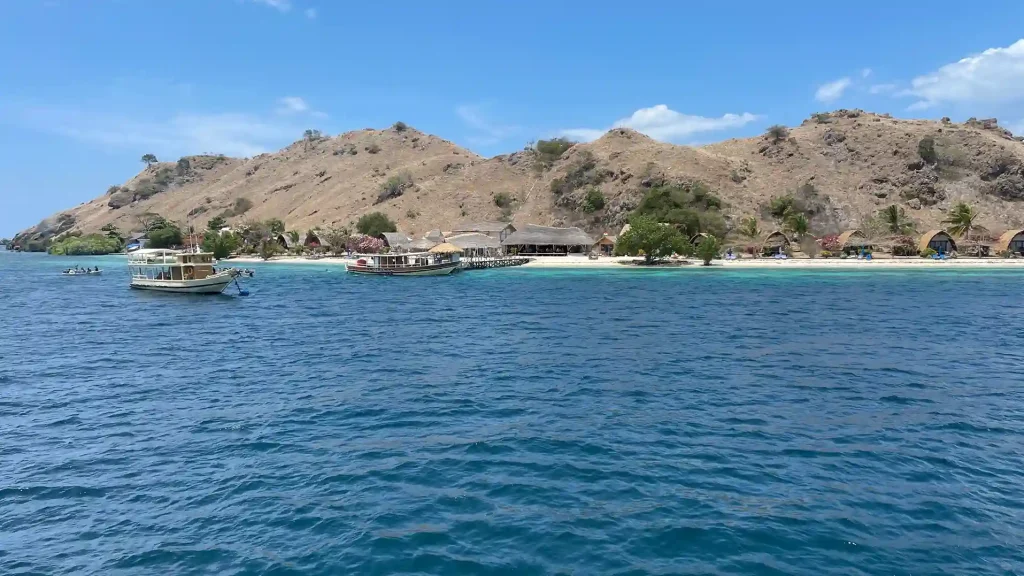 Boats moored off the shore of Sebayur Island