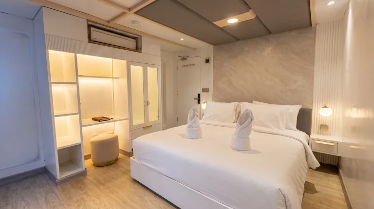 Master Suite bedroom with dressing area aboard LASHA