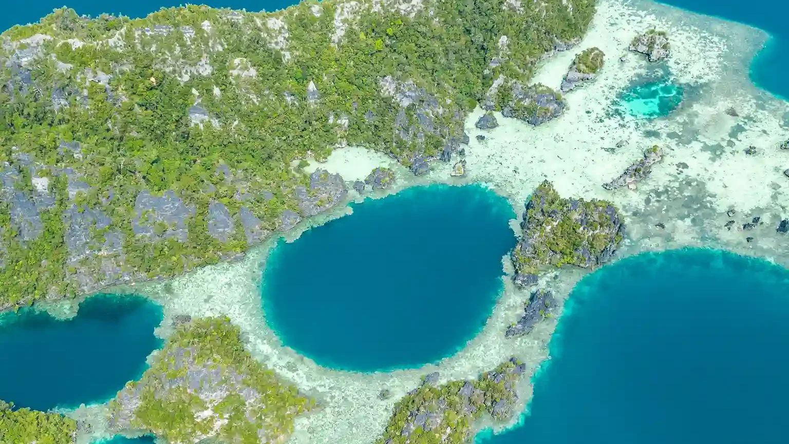 The view from Harfat Peak over the lagoons of southern Misool