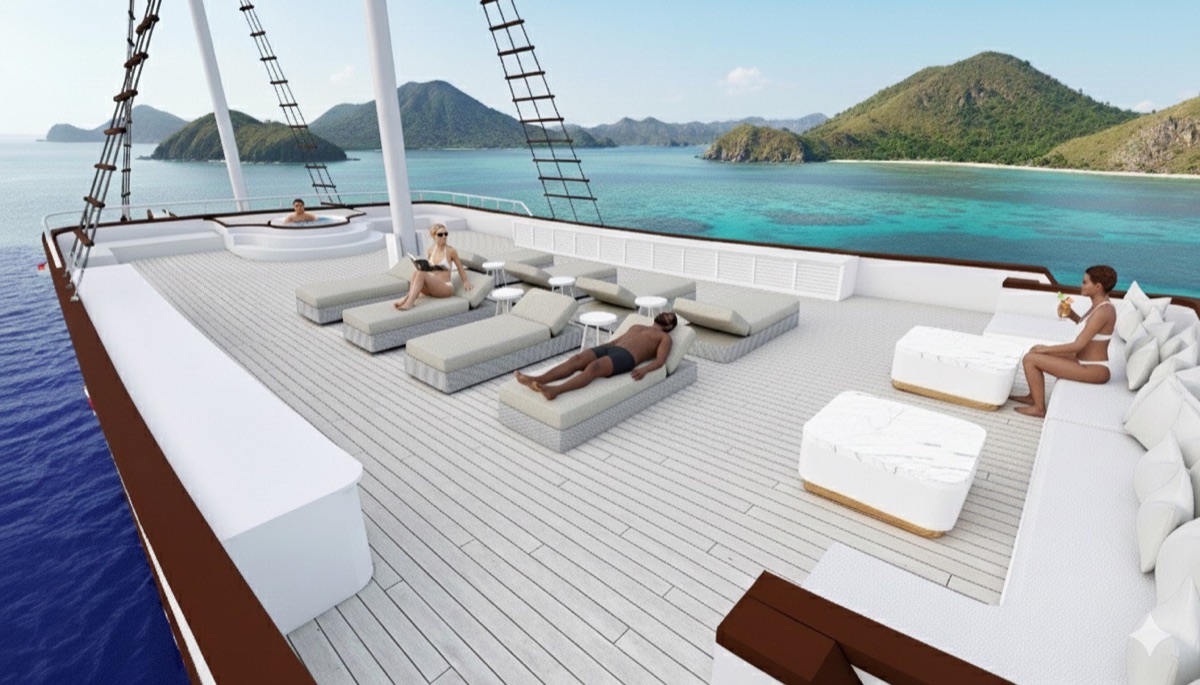 Sun loungers lined along the LASHA Top Deck under open sky